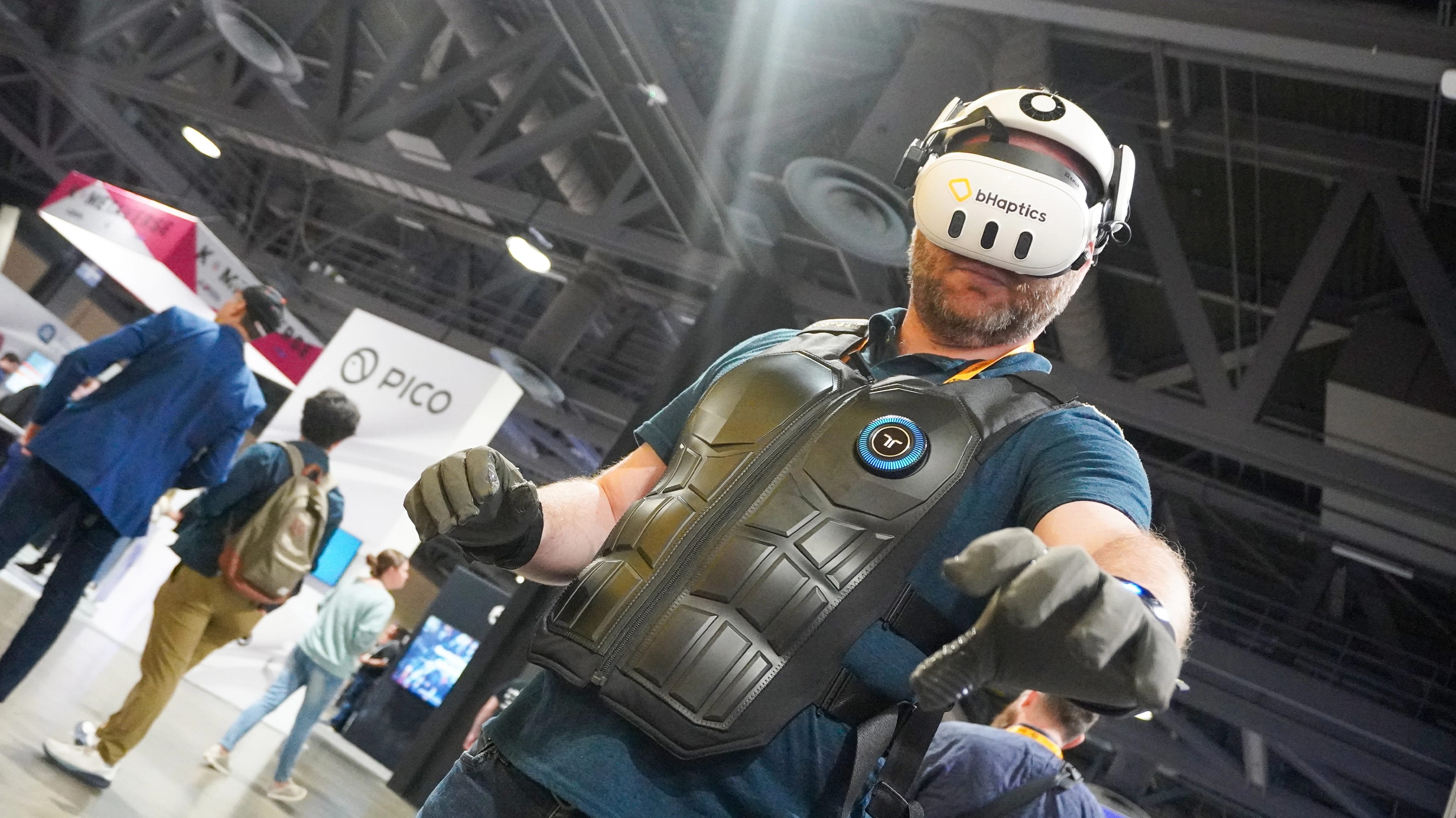 I tested the most advanced haptic VR vest and gloves — it made petting a cat feel too real?